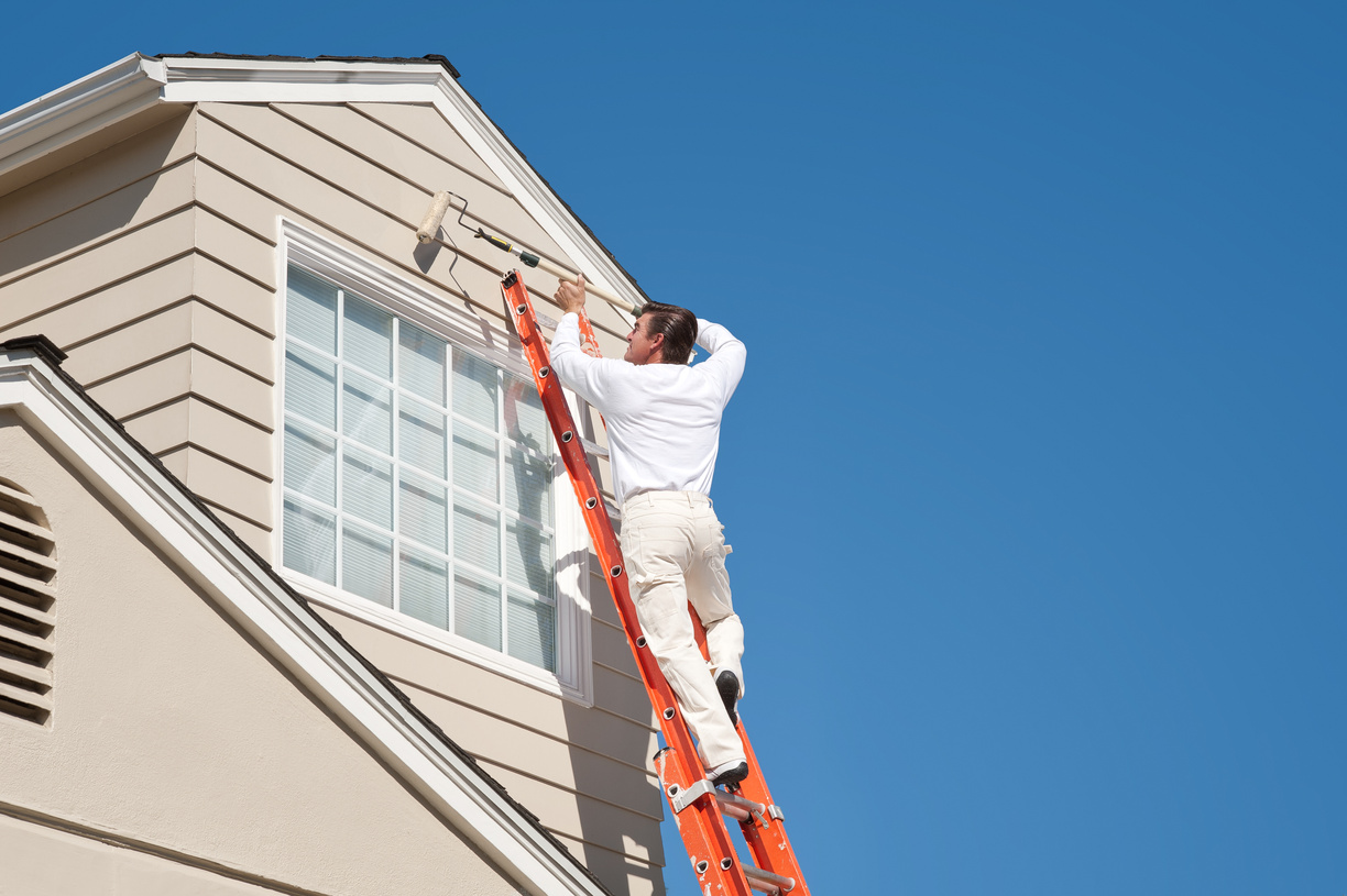 House Painter With Paint Roller